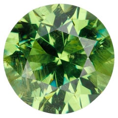 Faceted russian demantoid garnet 0.6 ct