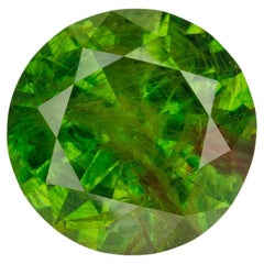 Faceted russian demantoid garnet 0.87 ct