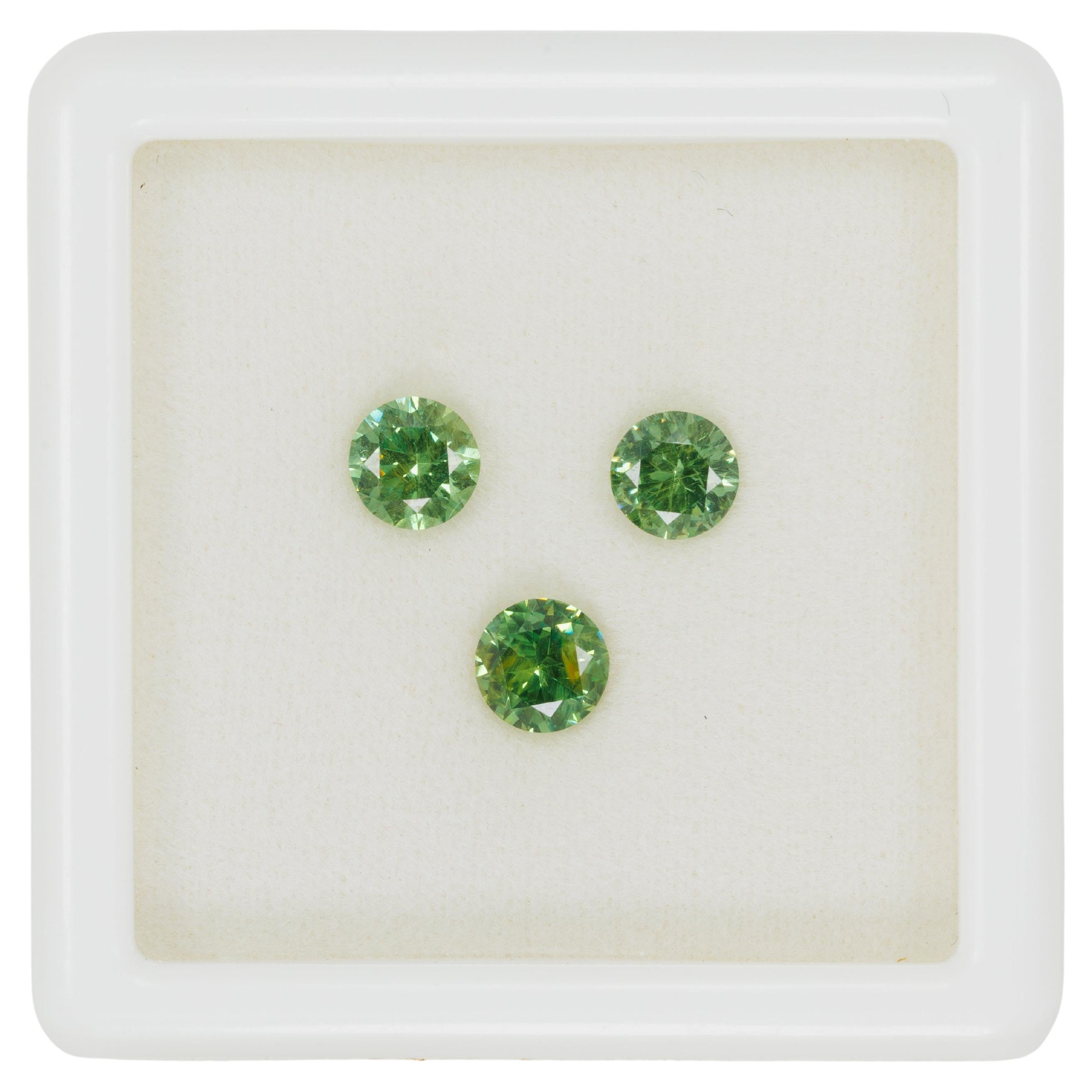 Faceted Russian demantoid pair set, 1.65 ct For Sale