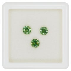 Faceted Russian demantoid pair set, 1.65 ct