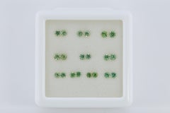 Faceted Russian demantoid pairs set, 1.3 cts