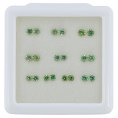 Faceted Russian demantoid pairs set, 1.3 cts