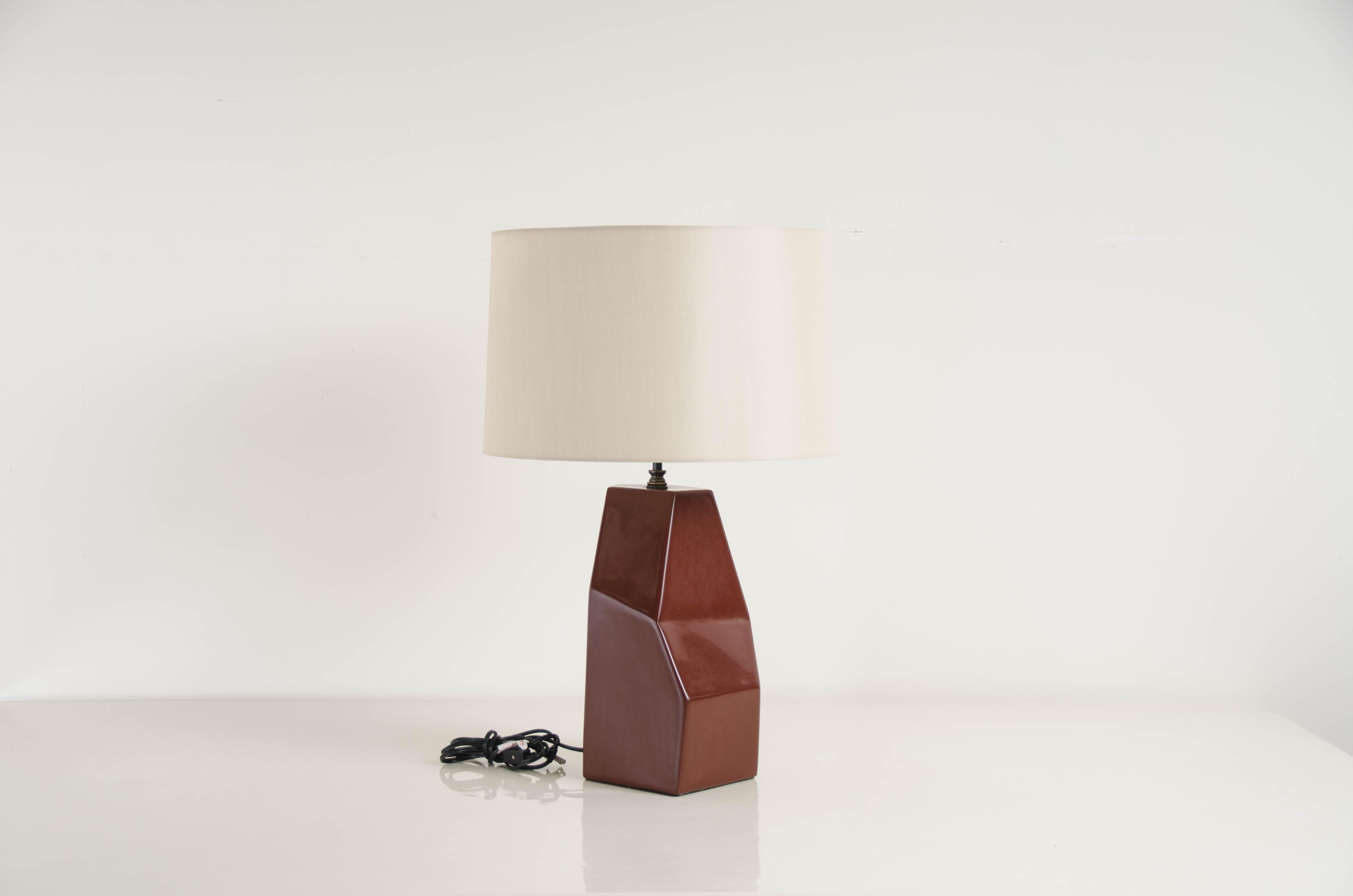 Faceted Shan lamp
Red bean lacquer
Hand repousse
Natural silk shade
Limited Edition
Base dimensions: 7 1/2