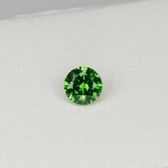 Faceted vivid green Rusisan demantoid garnet, 0.6cts