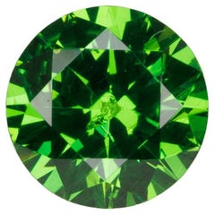 Faceted vivid green Rusisan demantoid garnet, 0.6cts