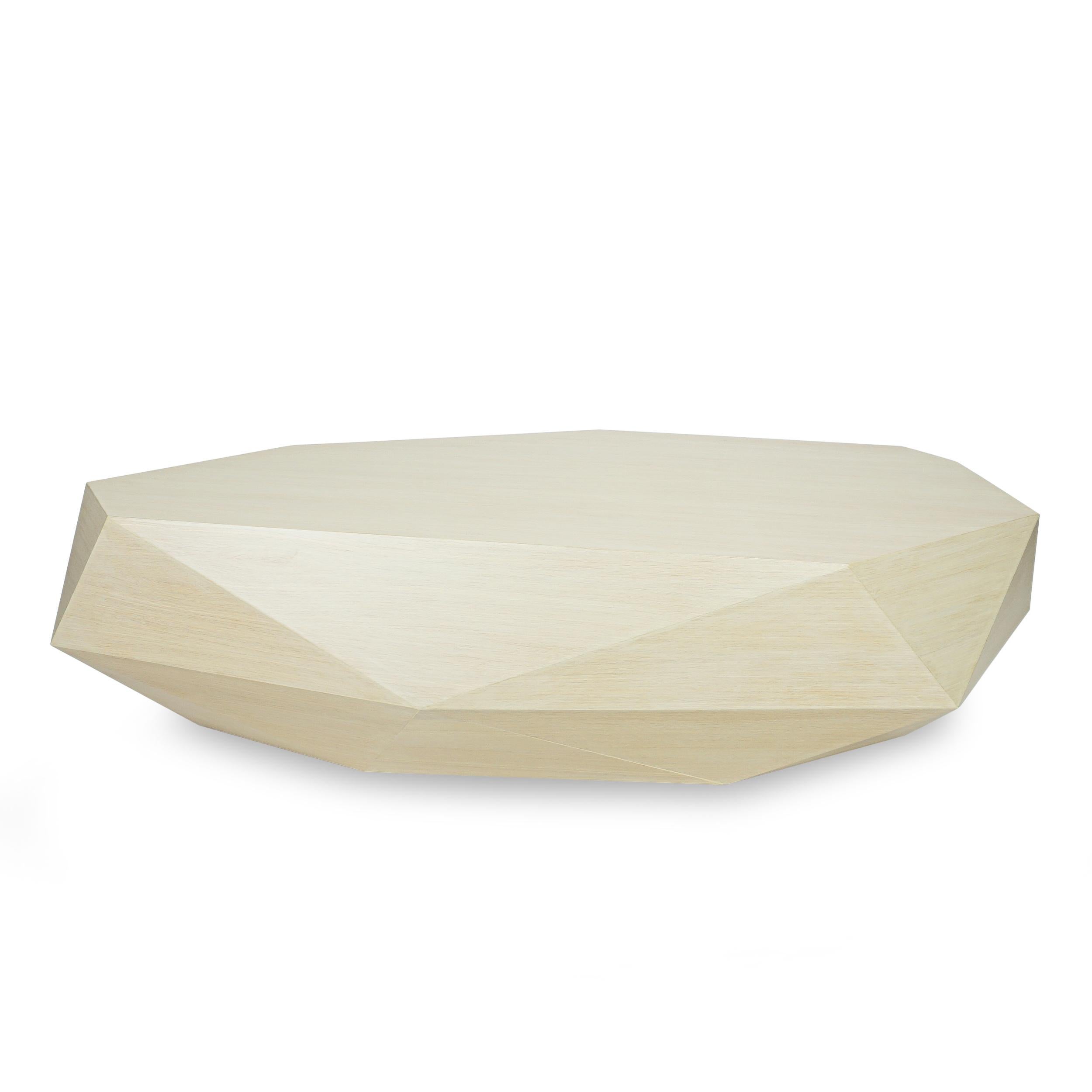 Faceted white oak veneer coffee table. Facets may not be identical from table to table. Handmade in Norwalk CT. Overall size and shape/orientation customizable.

Measurements:
Outside: 55”W x 24”D x 17”H

Price As Shown: $5,120 each
Customization