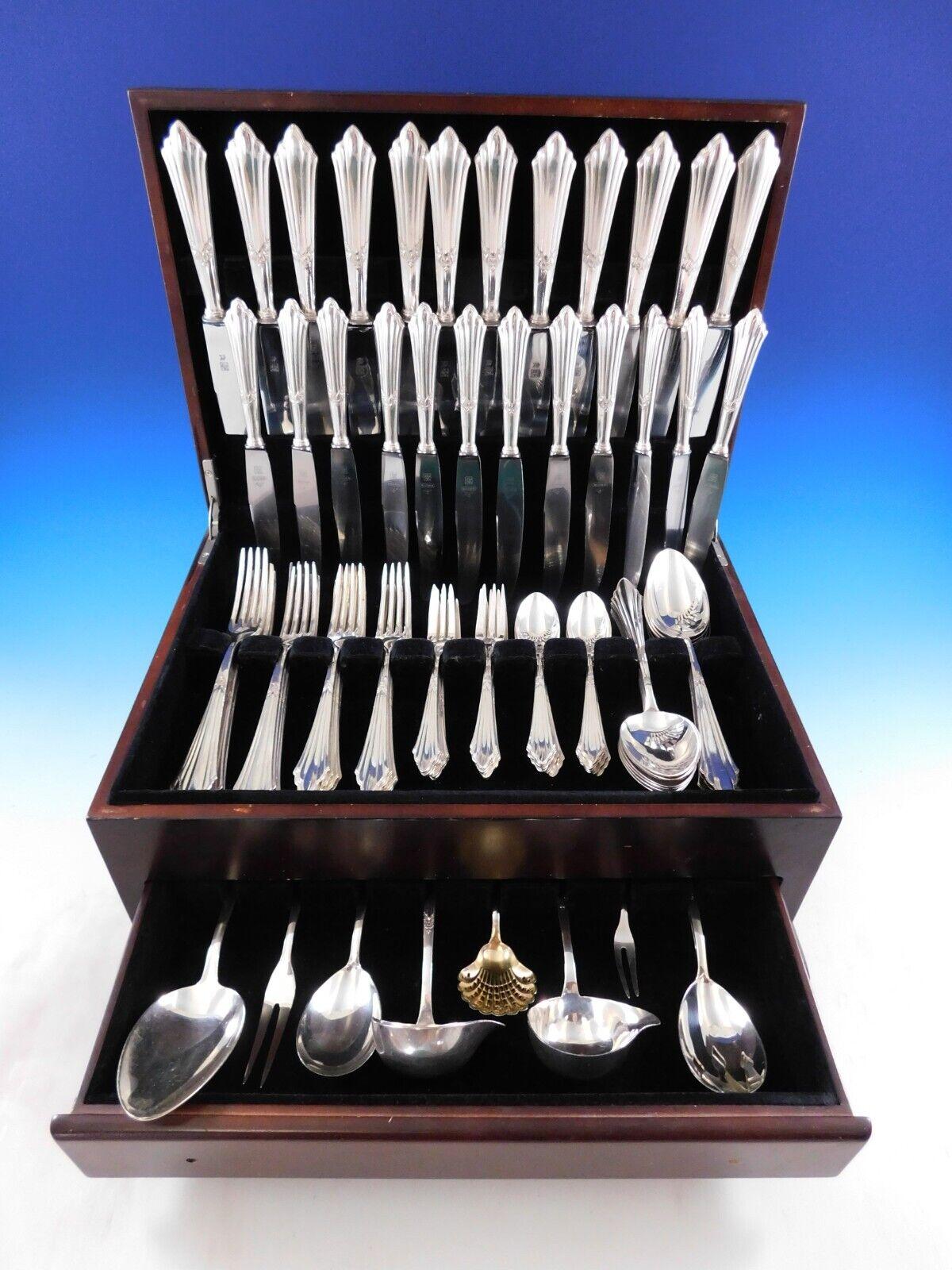Facher by WMF Silverplated German Flatware set - 91 pieces. This is the silverplated version of the sterling Fan pattern by WMF. This set includes:

12 Dinner Knives, 10 1/8