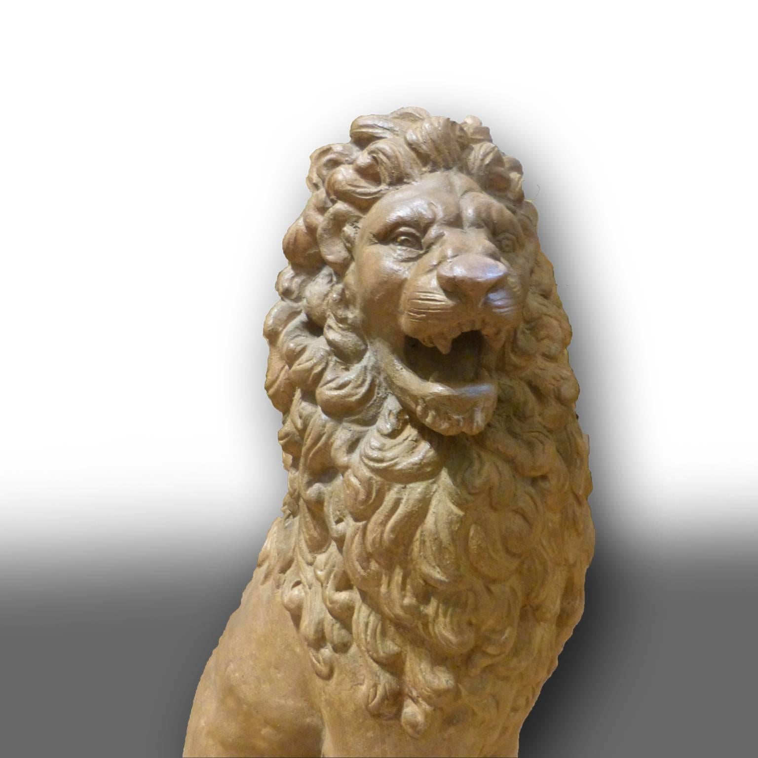 Mid-19th Century Facing Pair of Early 19th Century Tuscan Terracotta Lion Sculptures For Sale