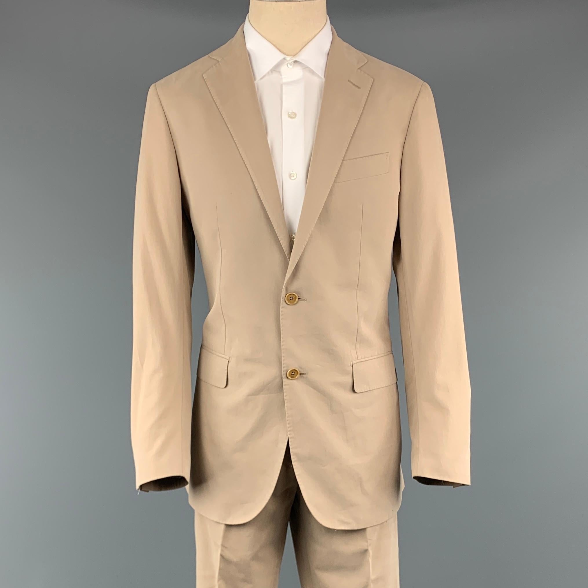 FACONNABLE suit comes in a khaki cotton and includes a single breasted, two button sport coat with notch lapel and matching front trousers.
 
Excellent Pre-Owned Condition.
Marked: 50
 
Measurements:
 
-Jacket
Shoulder: 18.5 in.
Chest: 40