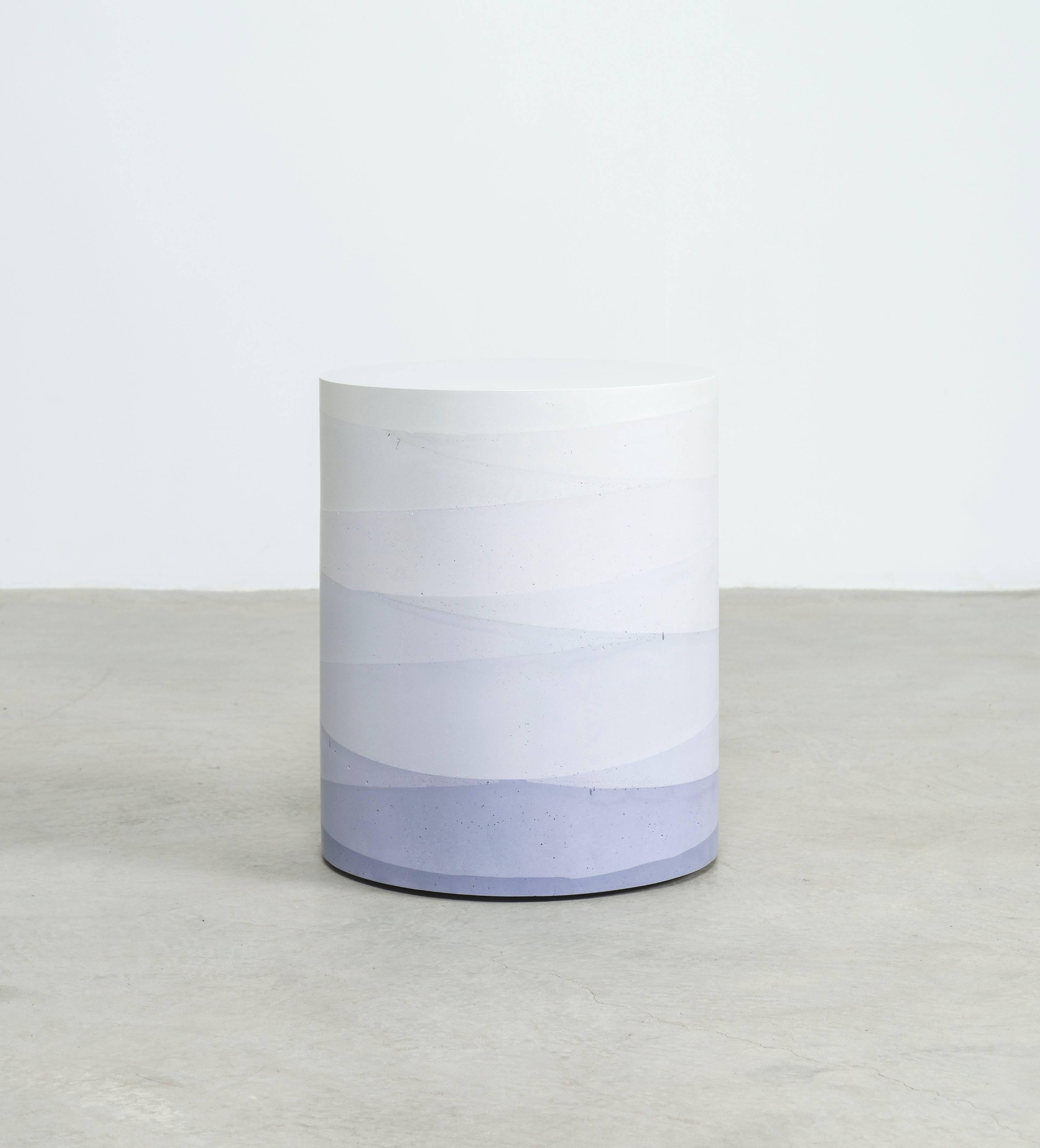 An exploration in the softness and subtly of the materials, the made-to-order drum has a hollow cavity and is cast entirely from hand-dyed cement. Poured in individual hand-dyed layers, starting from the base color lavender and fading to white, the