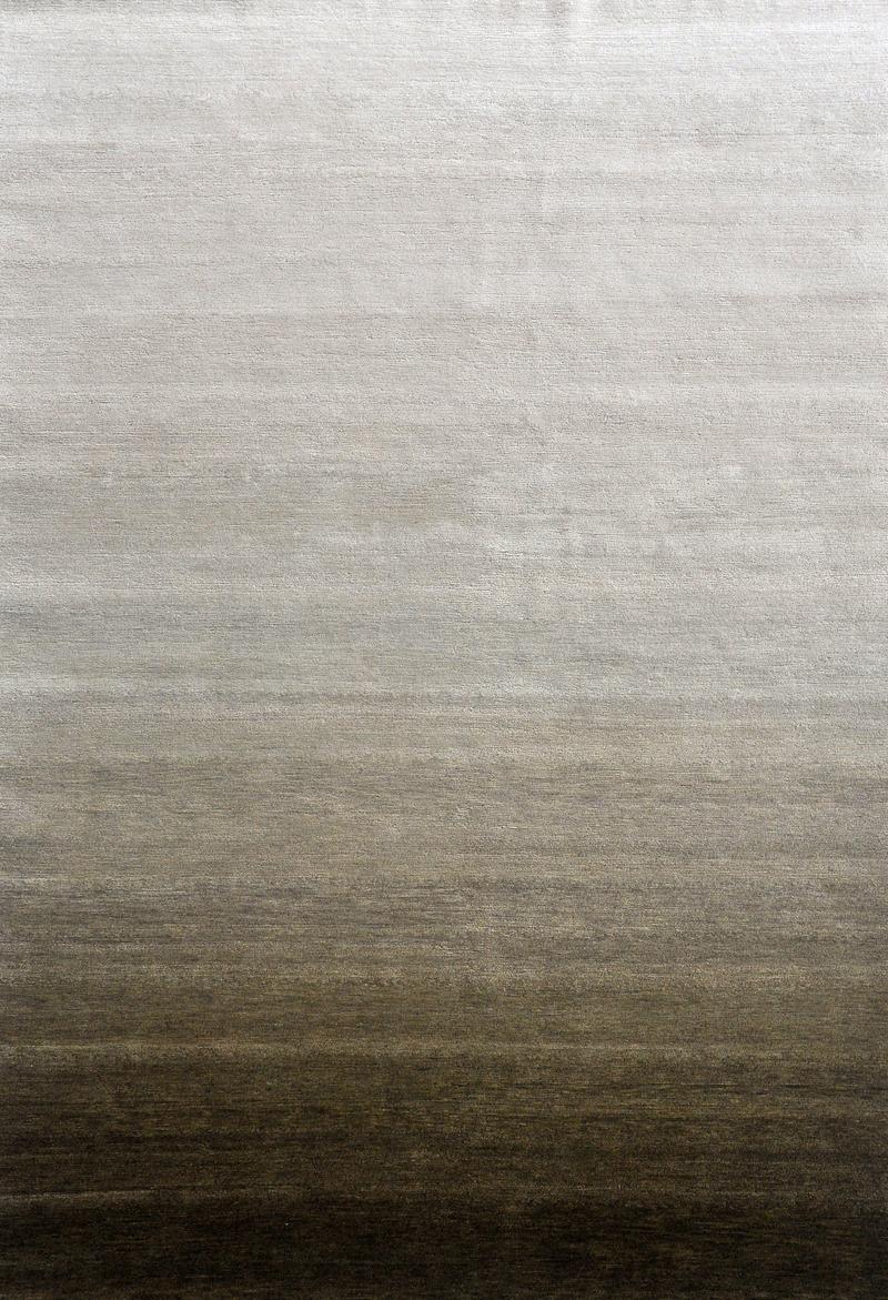 This is a beautiful ombre style rug seamlessly fades from lighter olive to darker olive. This stunning rug offers warm olive tones.

Erik Lindstrom offers a curated selection of contemporary, transitional, and textural patterns which evoke both