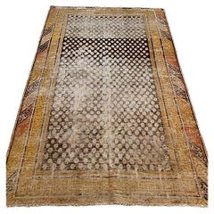 Khotan antique délavé 7'10 x 4'9″ (en anglais)