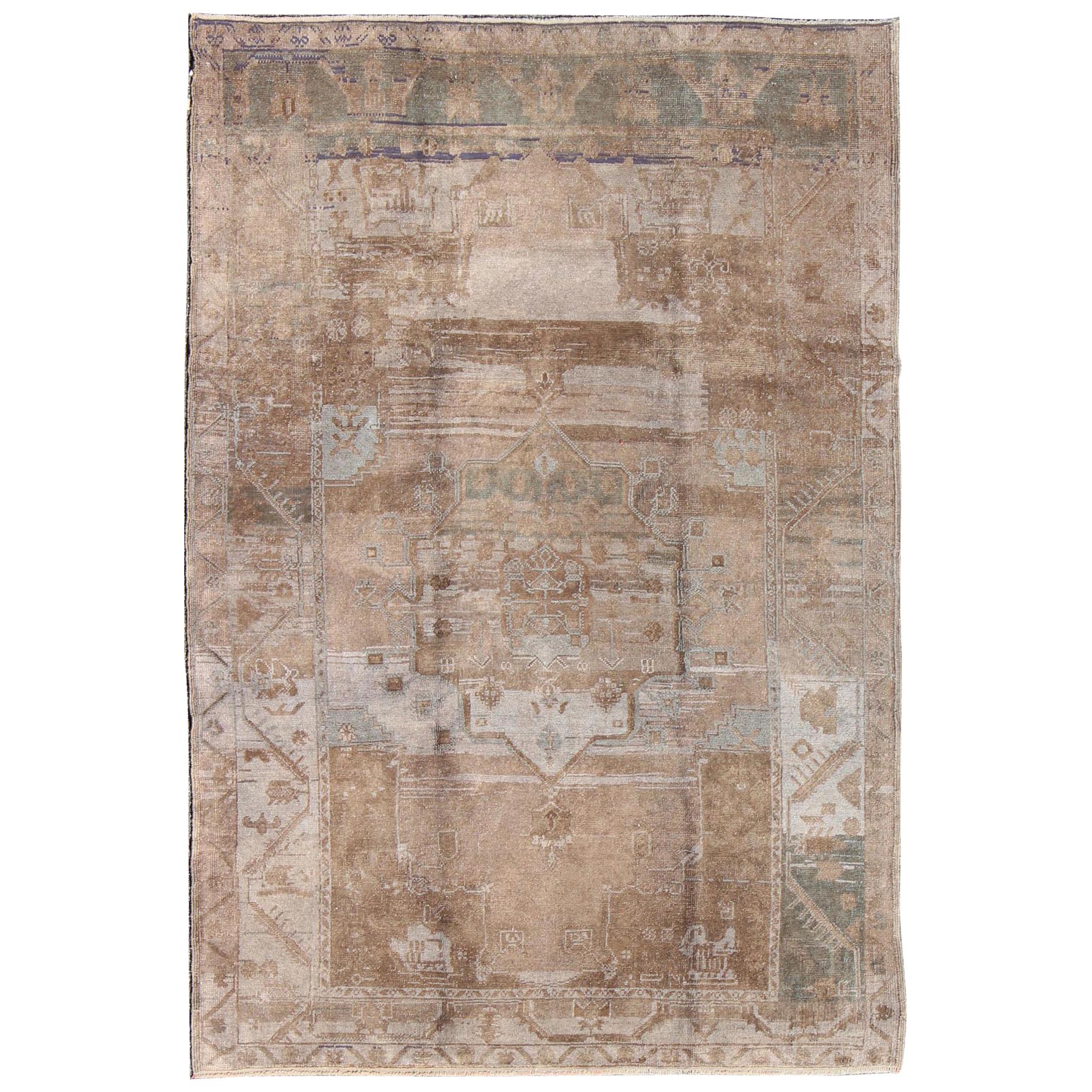 Faded Brown and Gray Vintage Oushak Rug from Turkey with Medallion Design For Sale