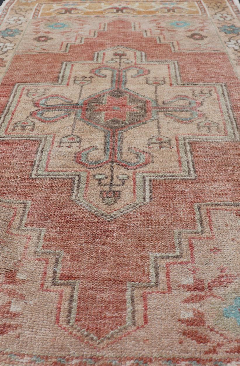 Faded Coral and Taupe Vintage Turkish Oushak Rug with Layered Medallion Design For Sale 1