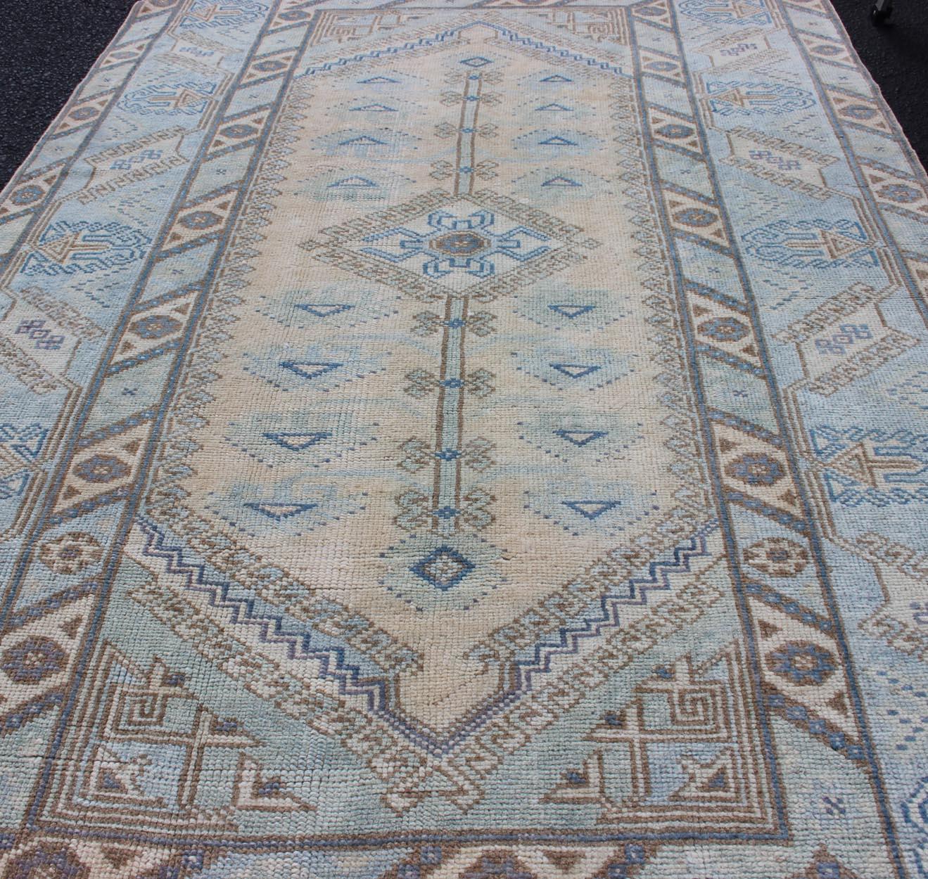 Faded Oushak Rug from Turkey with All Over Design in Blues and Cream In Good Condition For Sale In Atlanta, GA