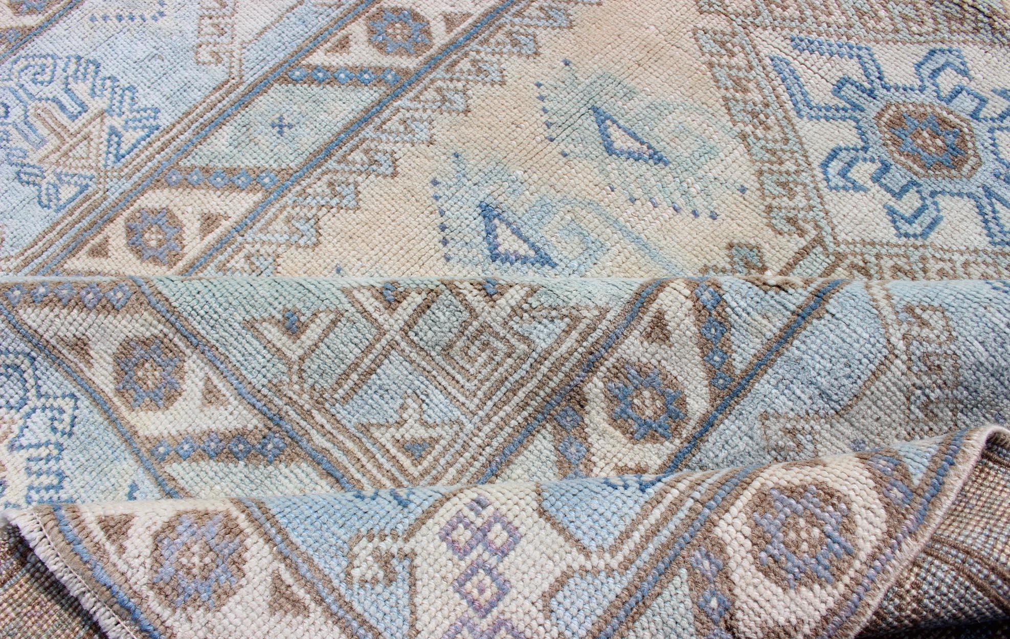 Faded Oushak Rug from Turkey with All Over Design in Blues and Cream For Sale 1