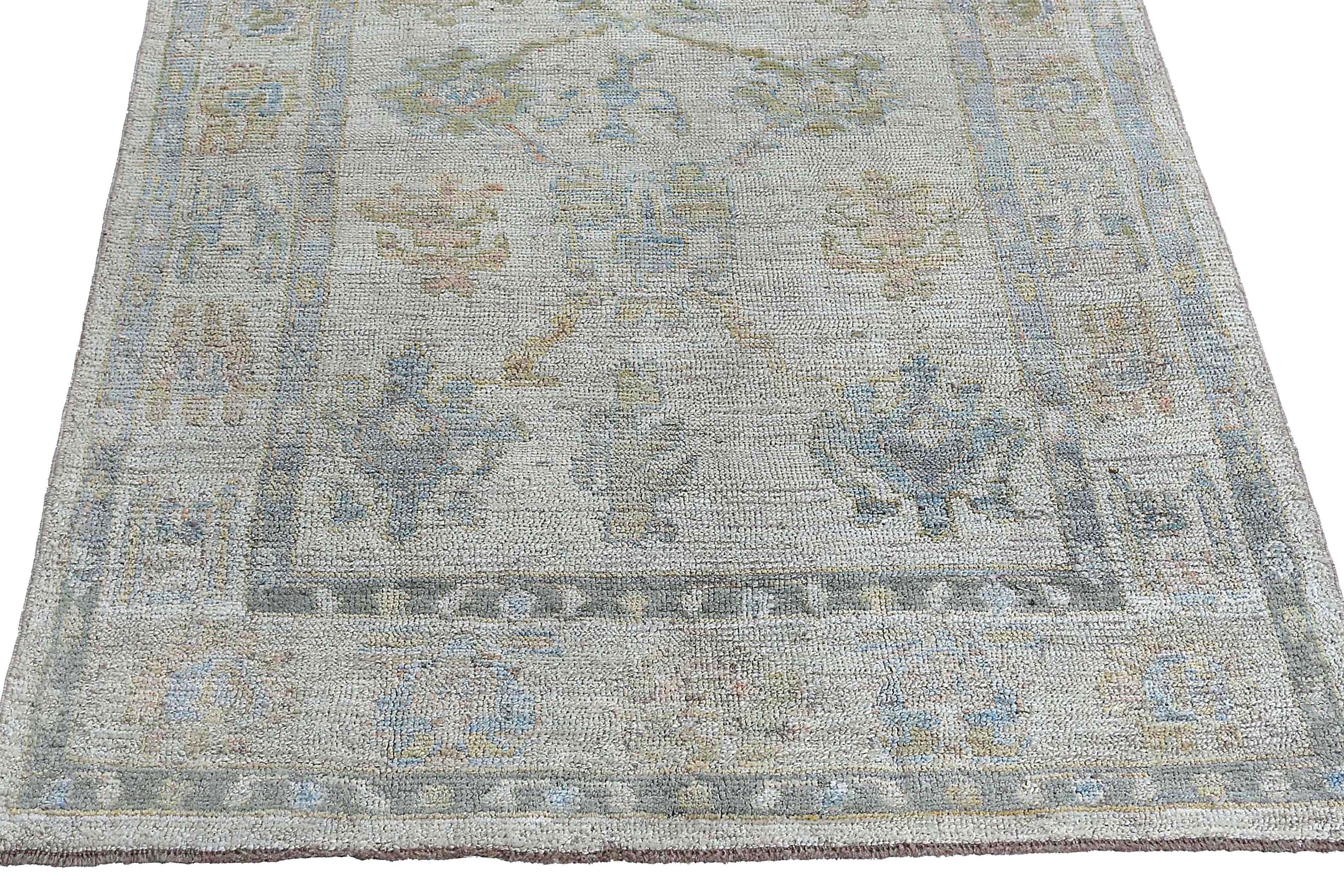 Faded Oushak Rug with Blue Tones For Sale 4