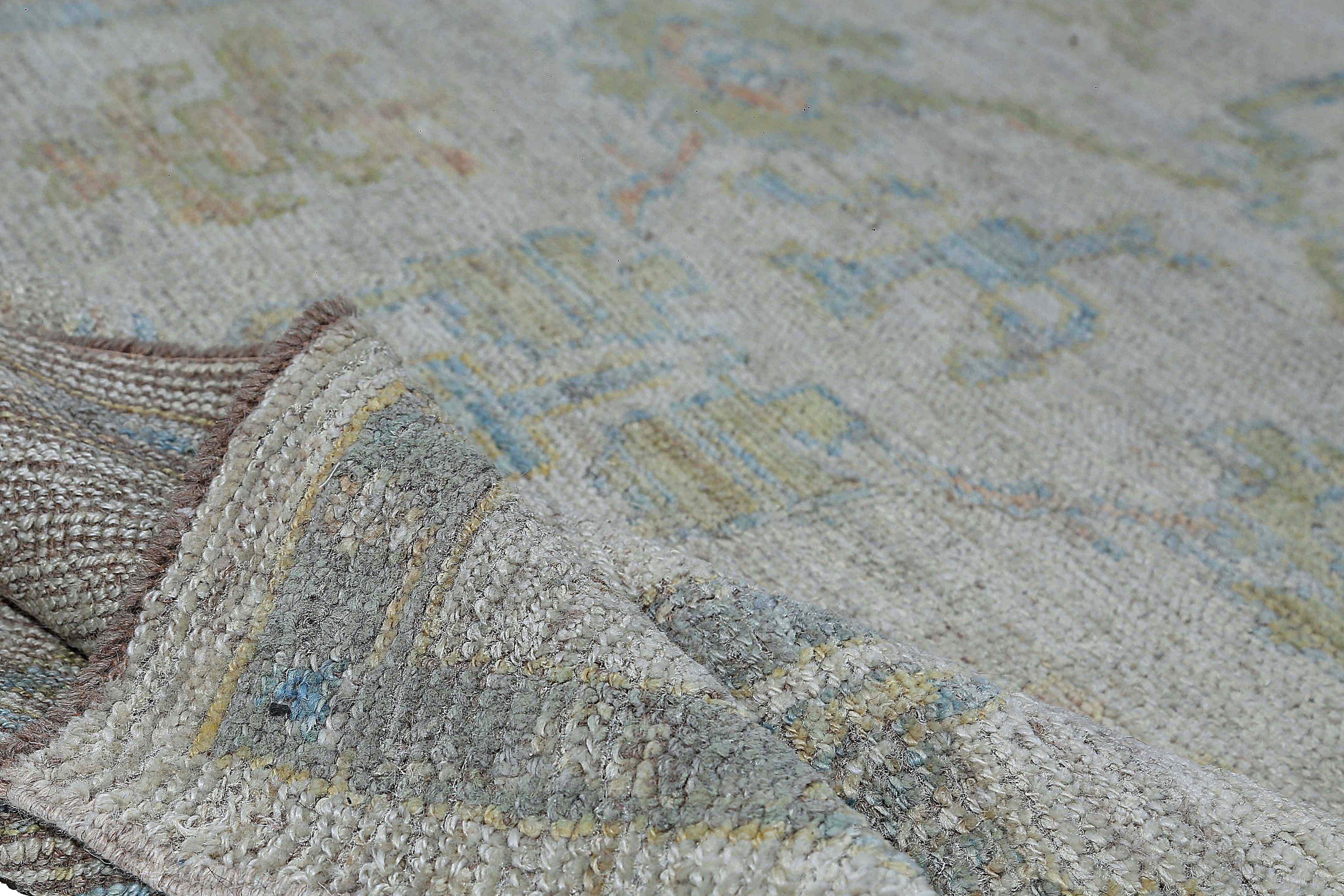 Contemporary Faded Oushak Rug with Blue Tones For Sale
