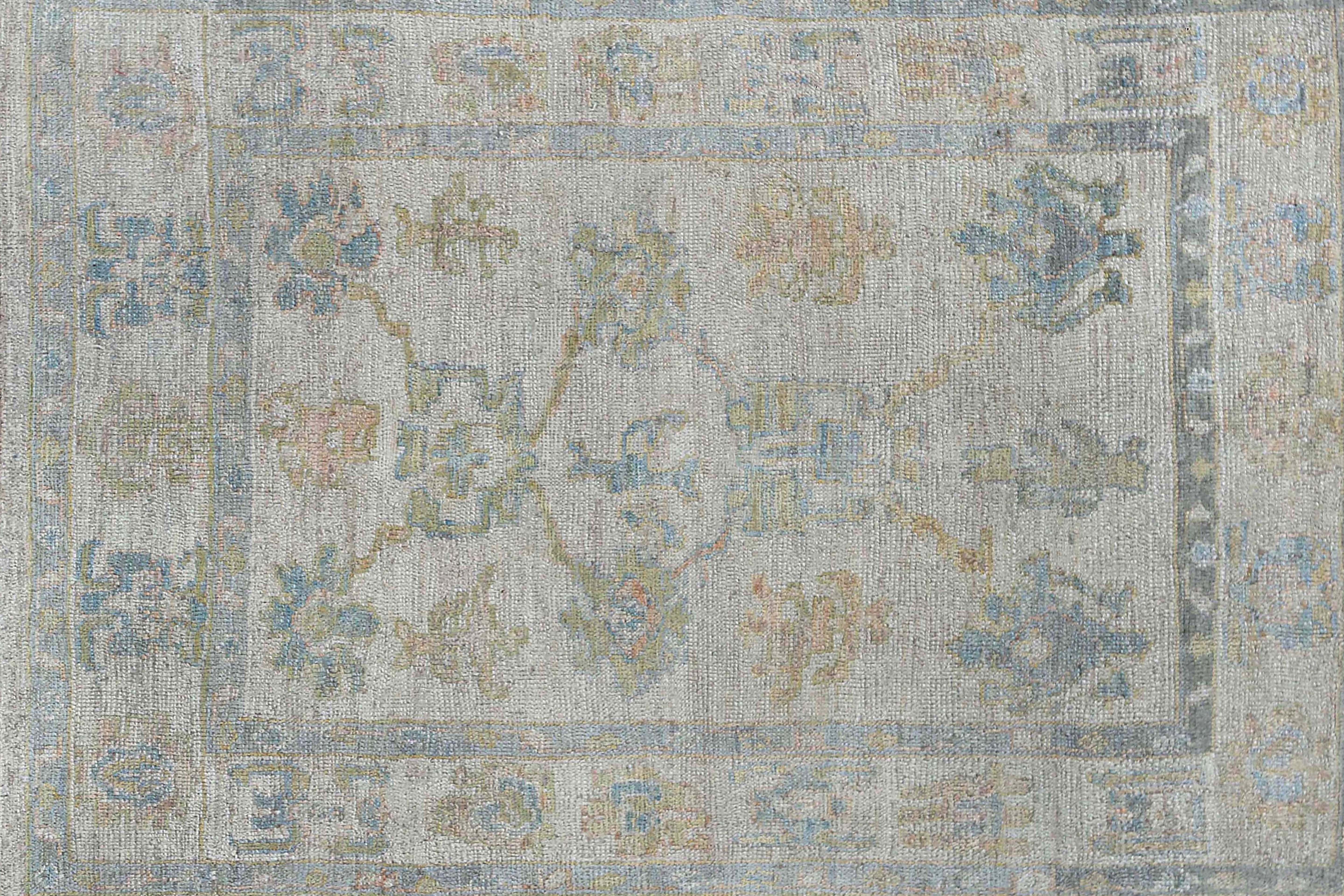 Faded Oushak Rug with Blue Tones For Sale 1