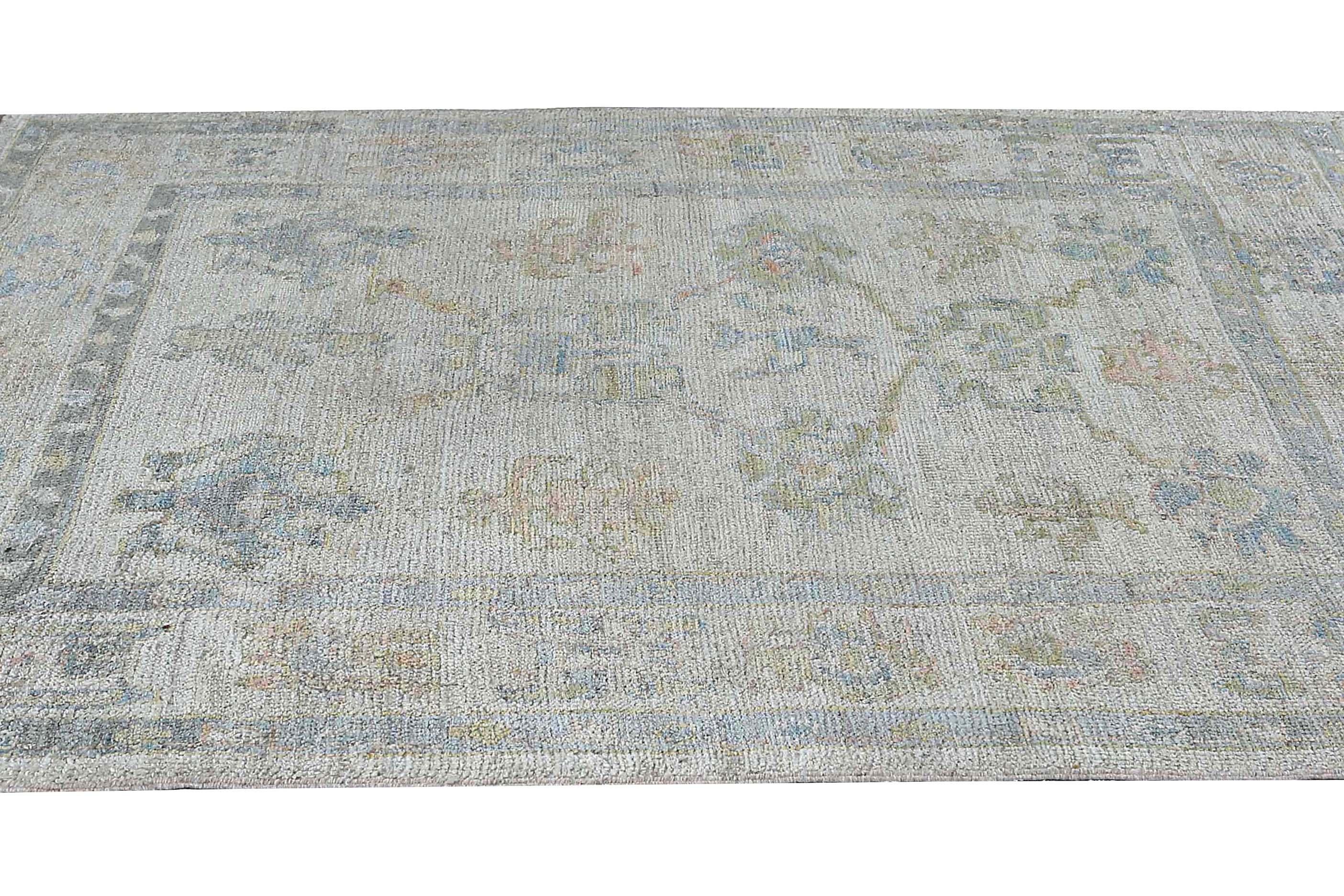 Faded Oushak Rug with Blue Tones For Sale 2