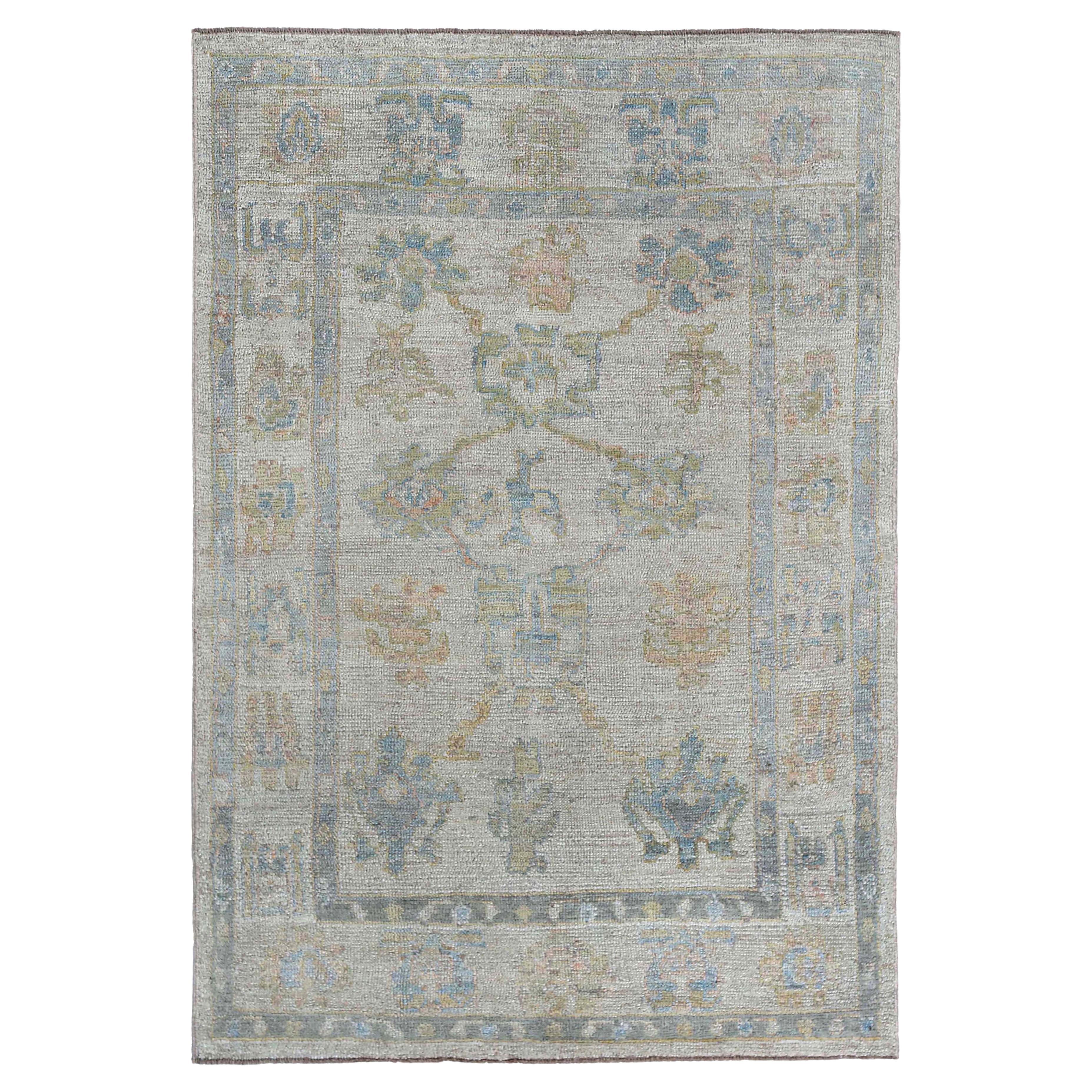 Faded Oushak Rug with Blue Tones