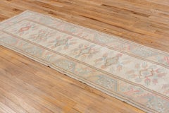 Faded Pastel Oushak Runner – Soft Coral and Sky Blue on Ivory