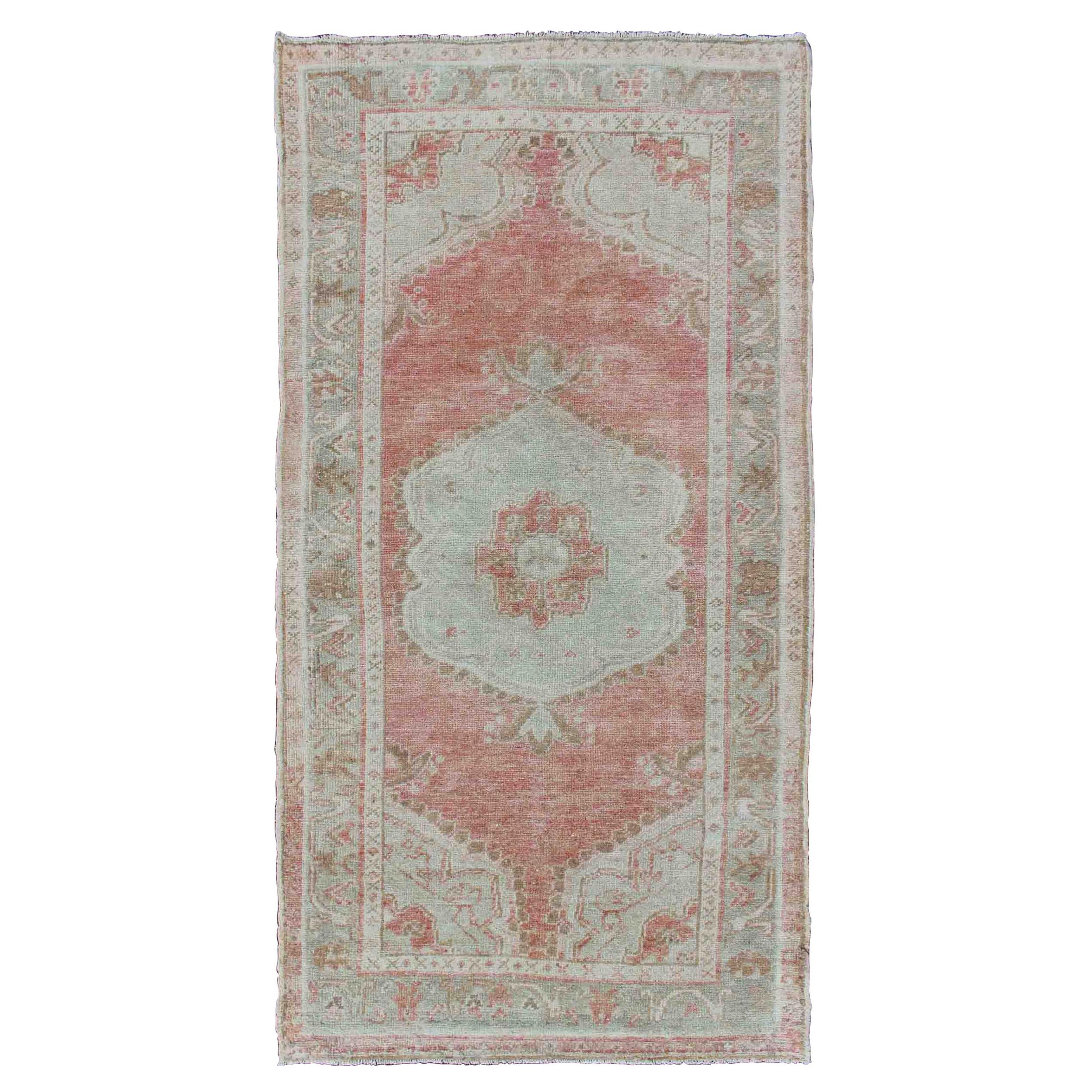 Faded Red and Taupe Vintage Turkish Oushak Rug with Layered Medallion Design