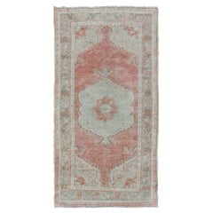 Faded Red and Taupe Vintage Turkish Oushak Rug with Layered Medallion Design
