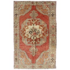 Faded Red and Taupe Vintage Turkish Oushak Rug with Layered Medallion Design