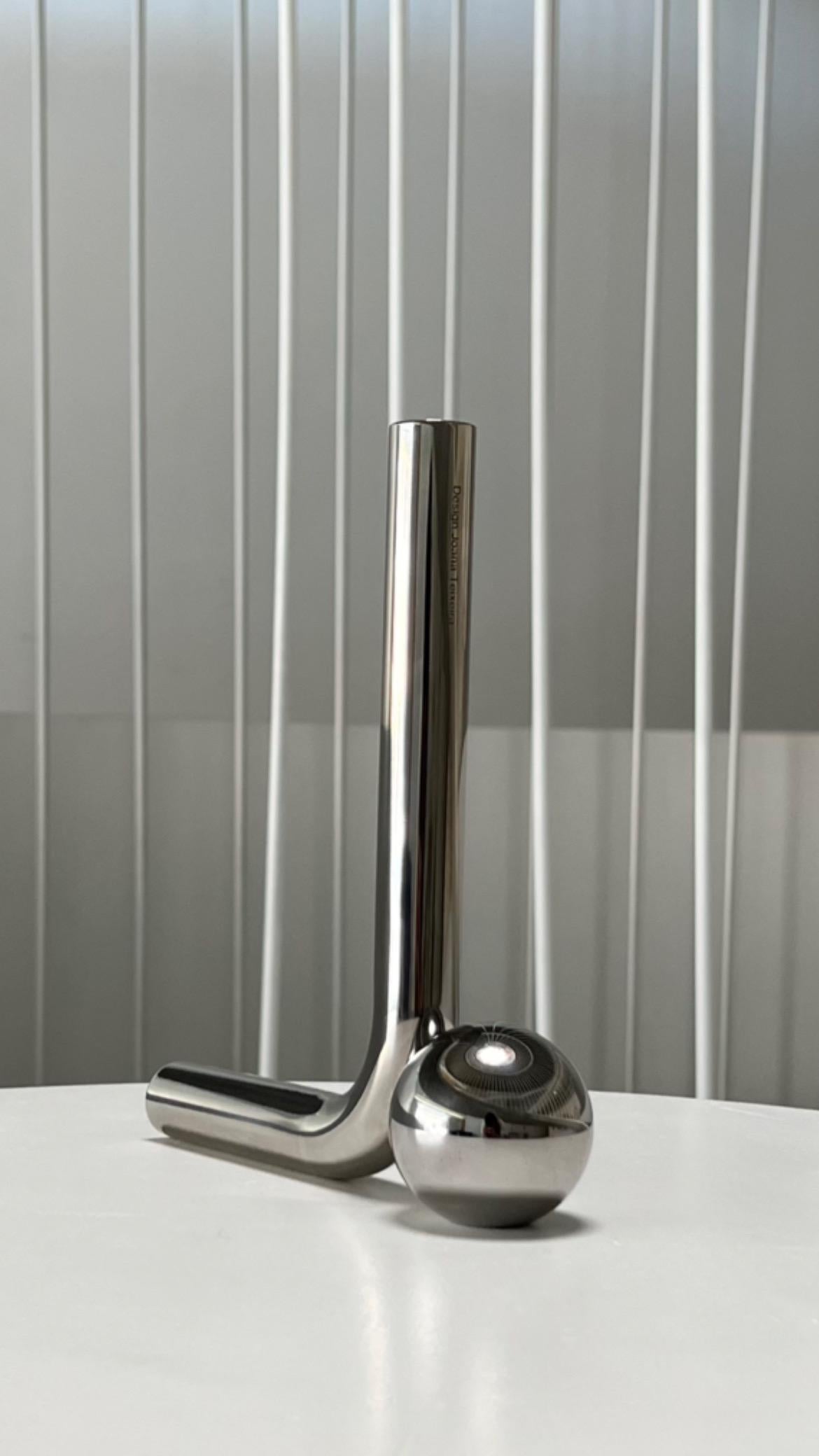 Fado Candlestick by Joana Teixeira
Limited Edition
Dimensions: D 19 x W 15 x H 22 cm.
Materials: Stainless steel.

Satin and chrome finishes are available. Customization is available upon request. Please contact us.
 
Time is a concept used to