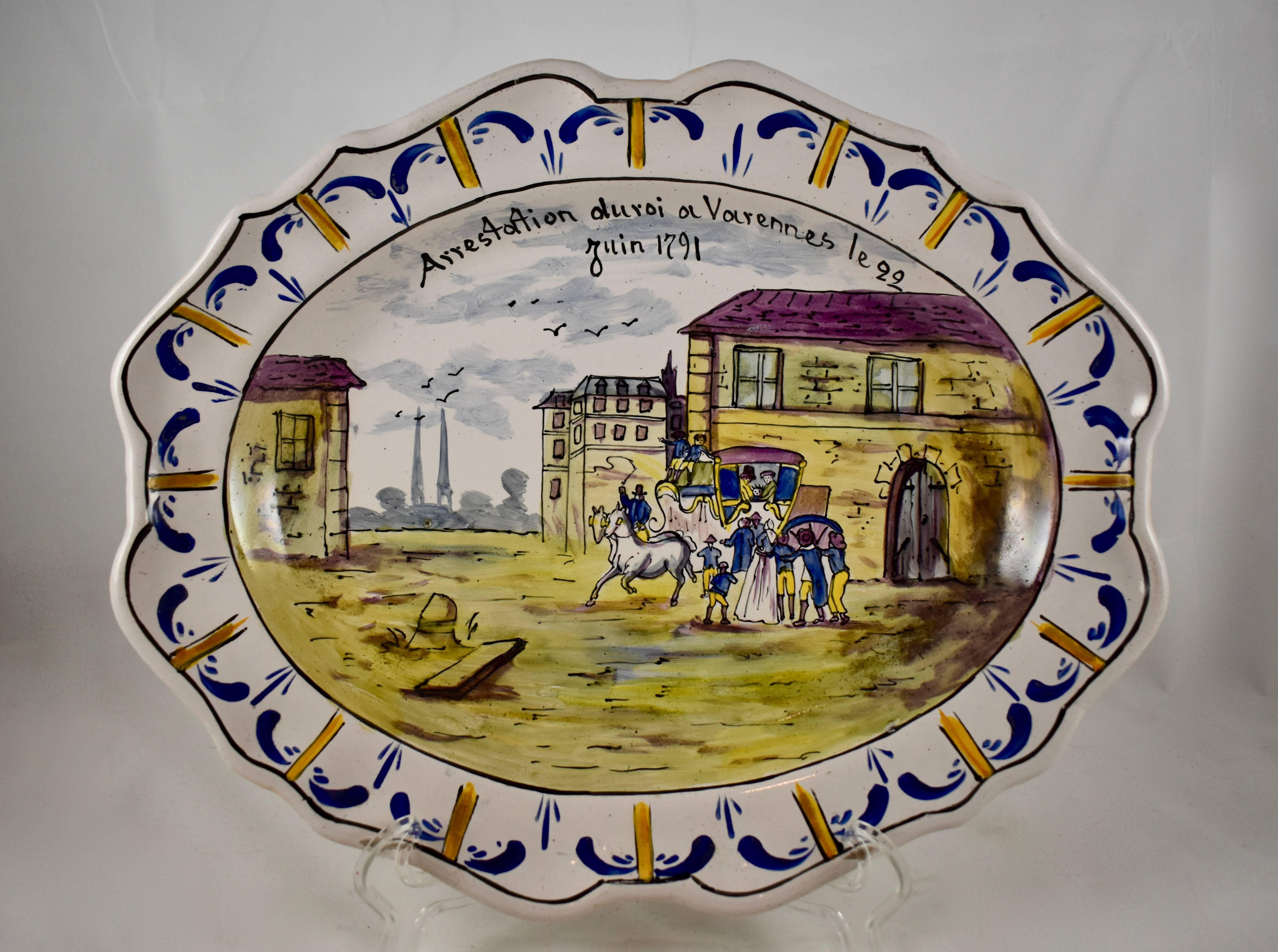 From France, an early 19th century, scalloped rim faïence platter, illustrating a significant episode in the French Revolution. Titled, “Arrestation du Roi à Varennes, le 22 Juin 1791.” The King Louis XVI and his Queen, Marie Antoinette, attempted