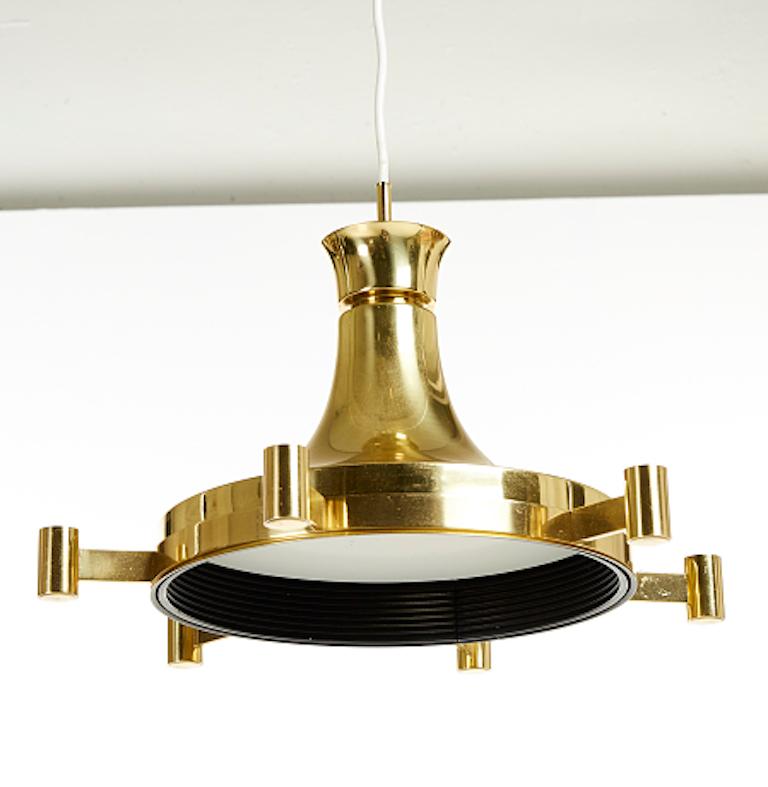 Modern Fagerhult ceiling fixture with six candle arms and brass frame, ceiling fixture with 6 candle arms for candles and also electrified (bulb in the interior), brass, diameter about 44 (17.5 inches), height about 28 cm (11 inches)- Height is