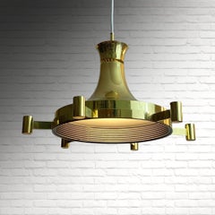 Fagerhults Belysning, a pair of mid-century brass pendant lamps, Sweden, 1960s