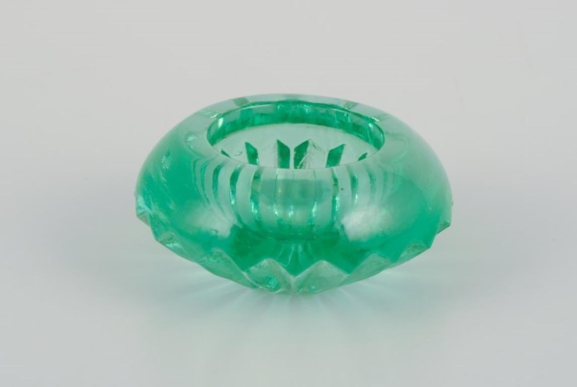 Fåglavik Glasbruk (1874-1980), Sweden.
Six salt cellars in colored glass. Handmade green glass.
Private Swedish collection.
Mid-20th century.
In perfect condition.
Largest: D 5.5 cm x H 2.5 cm.
