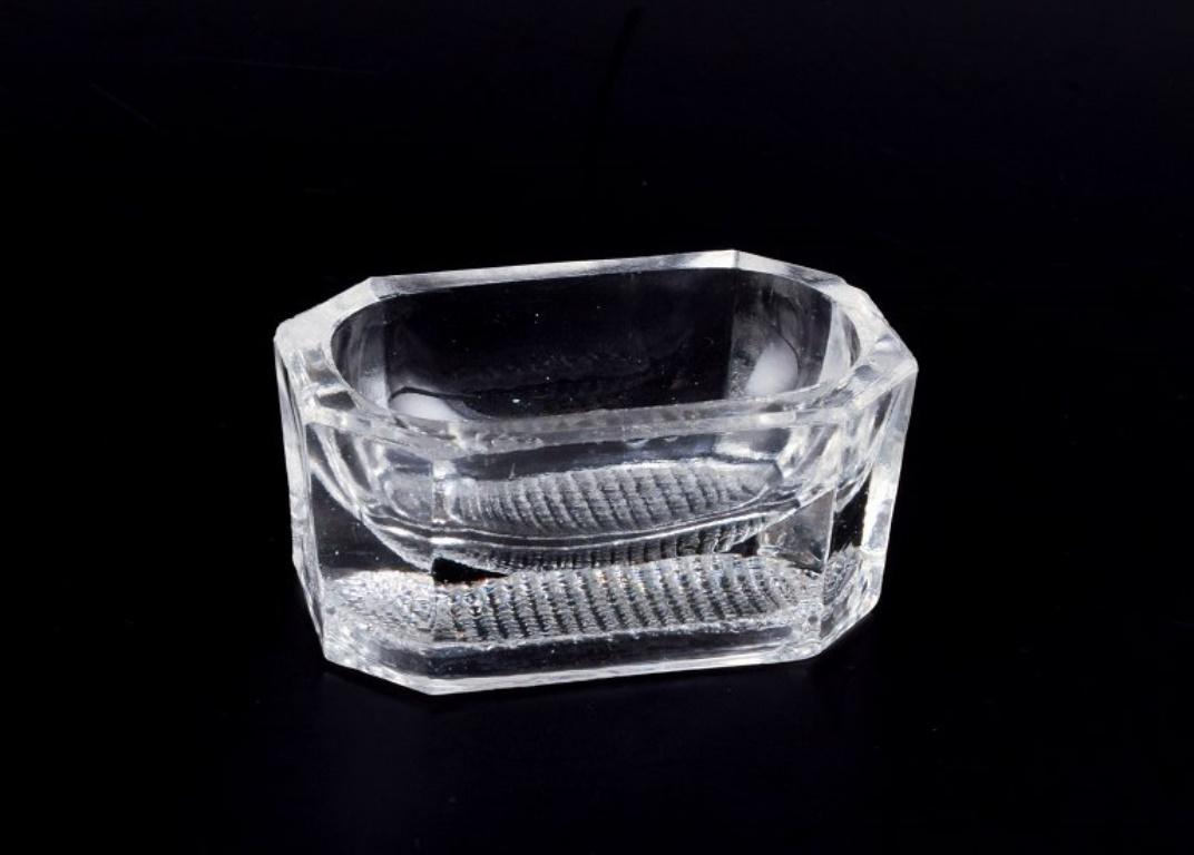 Fåglavik Glasbruk (1874-1980), Sweden.
Four salt cellars in clear handcrafted glass.
Private Swedish collection.
Mid-20th century.
In excellent condition.
Largest: Length 7.5 cm x Diameter 5.0 cm x Height 3.5 cm.
