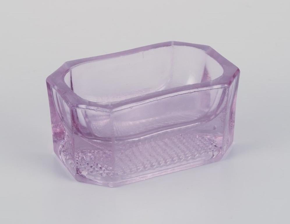 Fåglavik Glasbruk (1874-1980), Sweden.
Four salt cellars in colored glass. Purple handcrafted glass.
Private Swedish collection.
Mid-20th century.
In excellent condition.
Largest: Length 7.5 cm x Diameter 4.5 cm x Height 3.5 cm.
