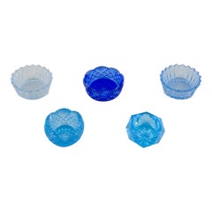 Fåglavik Glasbruk, Sweden. Five salt cellars in blue glass. Mid-20th C.