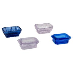 Fåglavik Glasbruk, Sweden. Four salt cellars in blue and purple glass.