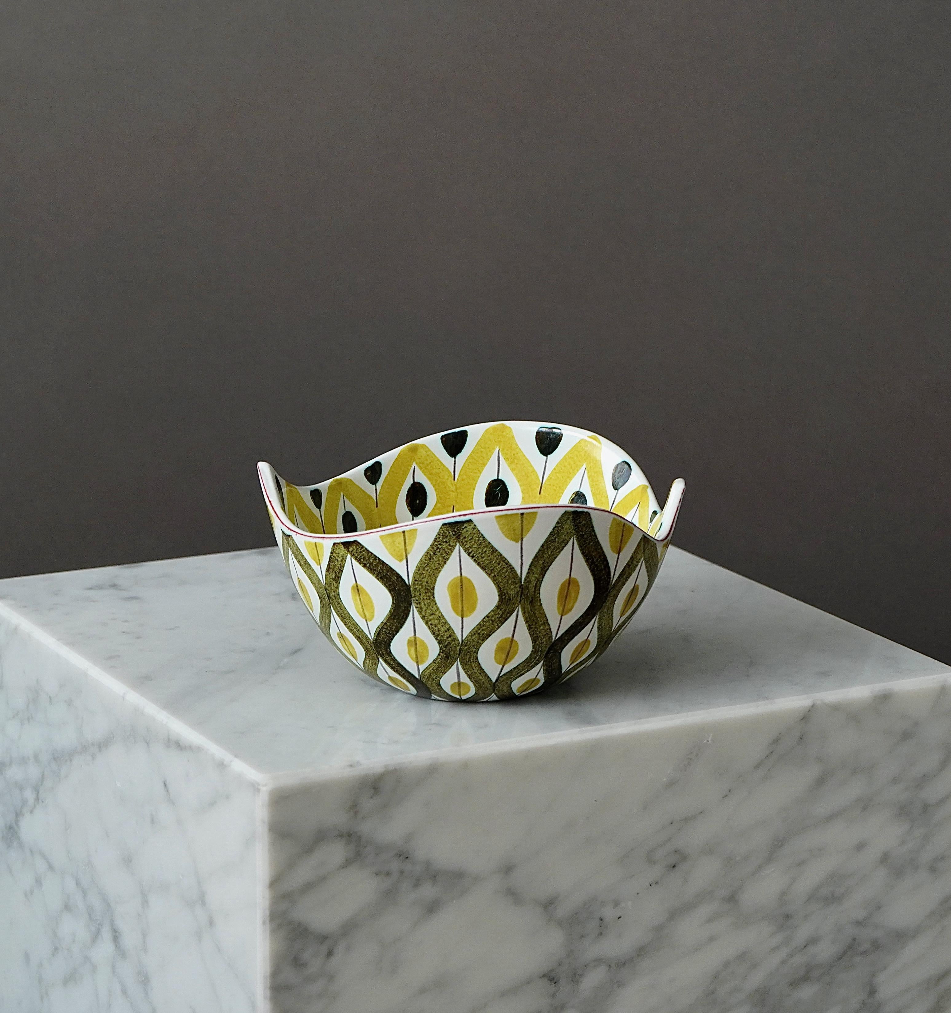 A beautiful faience bowl with amazing geometric pattern.
Designed by Stig Lindberg in Gustavsberg Studio, Sweden, 1950s.

Excellent condition.
Signed with the Gustavsberg studio hand.

Stig Lindberg and Gustavsberg’s artistic leader Wilhelm Kåge