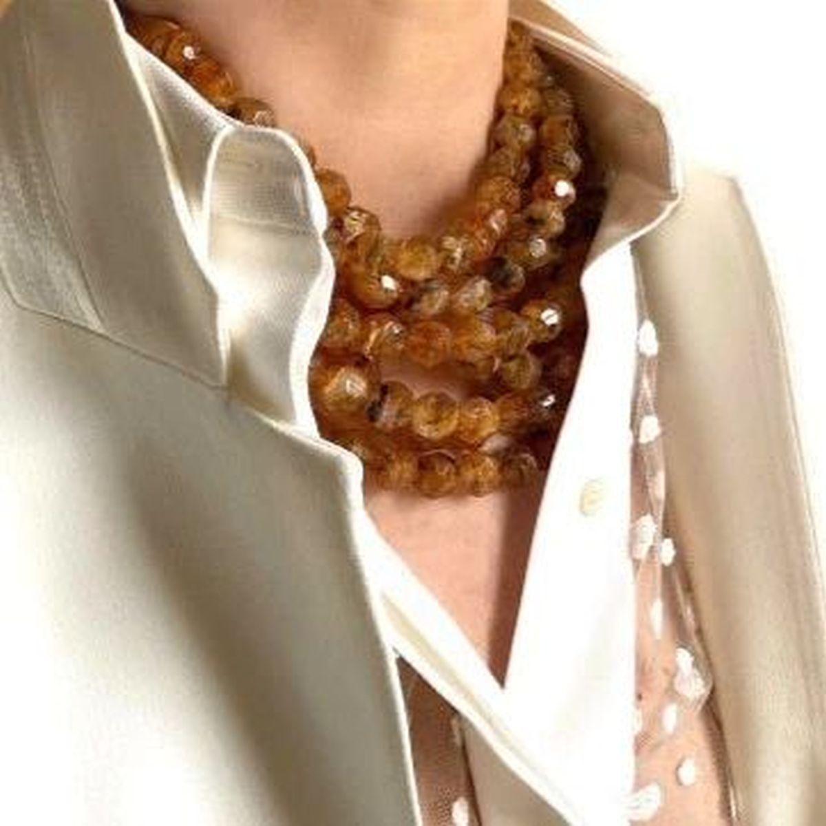 Simply Beautiful! Summer in a Necklace Fairchild Baldwin 12mm Faceted Tortoise Resin Bella 
Lightweight Multi Strand Beads Necklace 
Leather Collar Adjustable magnetic closure Hand crafted in Italy 
Comes with a leather extender and your own