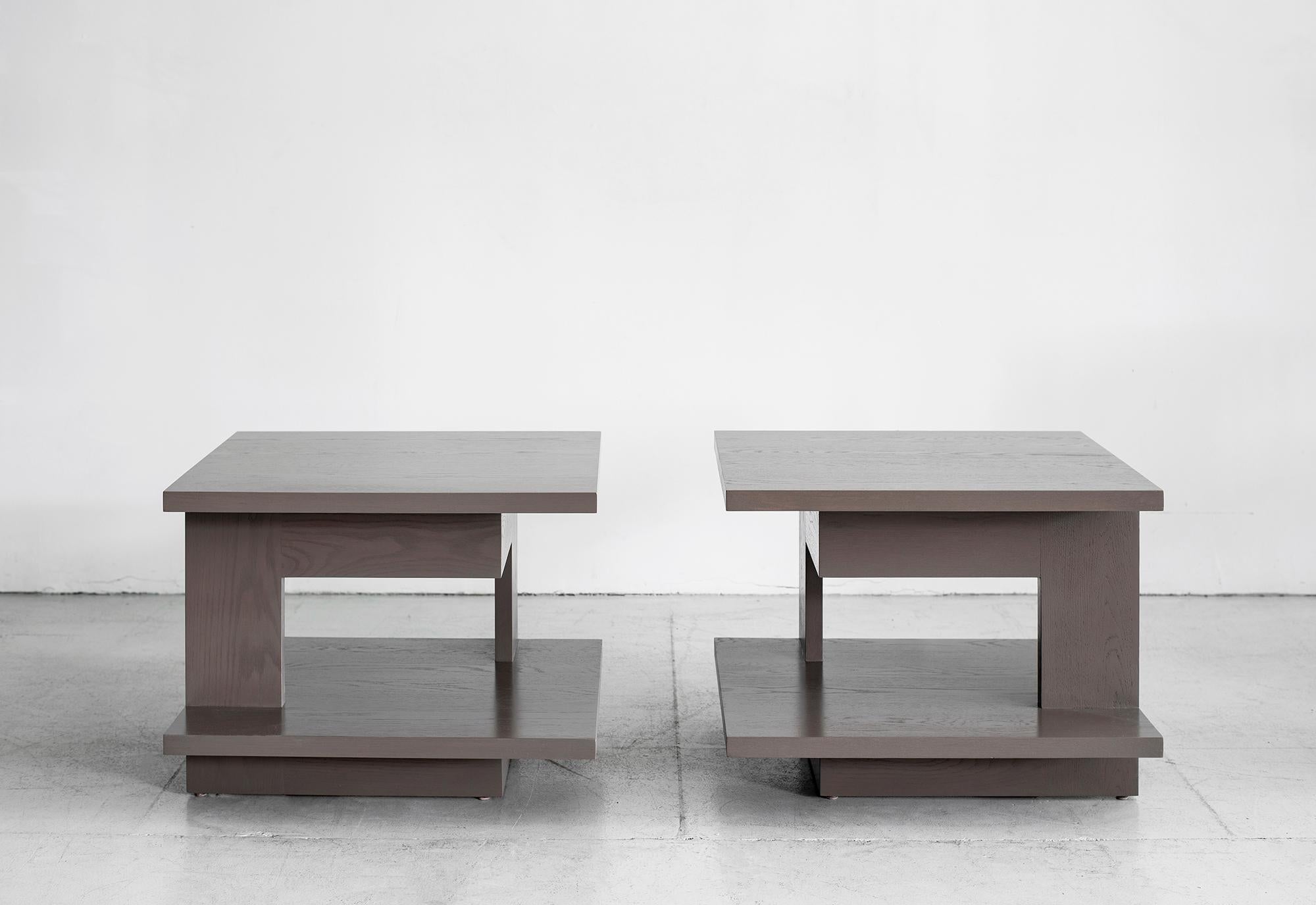 Pair of end tables with geometric shaped design and pull out / pull-out drawer. Great from all angles. Newly produced by Orange in oak with grey smoke stained finish.