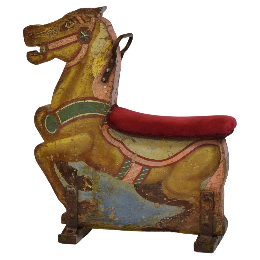 A wonderful Art Deco period decorative fairground wooden horse with the original painted finish. Circa 1930.

The seat has been reupholstered in a mid-dark red velvet close to the original example. 

Wooden wedges have been added and aged, and