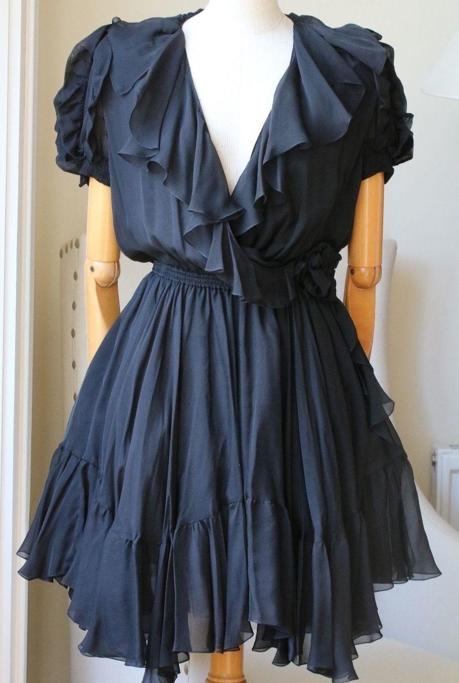 Faith Connexion silk puff shoulder dress features ruffles around the chest. 100% Silk. 

Size: Small (UK 8, US 4, IT 40, FR 36)

Condition: As new condition, no sign of wear. 
