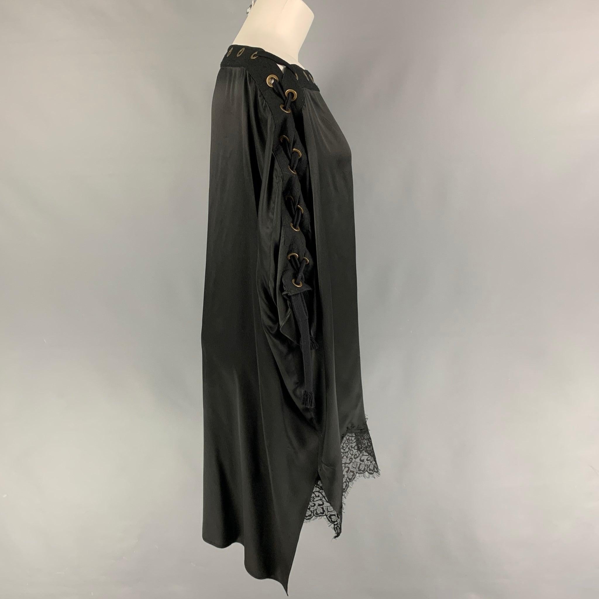 FAITH CONNEXION dress top comes in a black silk featuring a oversized fit, grommet details, tie up design, and a lace trim.
Very Good
Pre-Owned Condition. 

Marked:   S 

Measurements: 
 
Shoulder: 25 inches  Bust: 60 inches  
Sleeve: 9.5 inches 