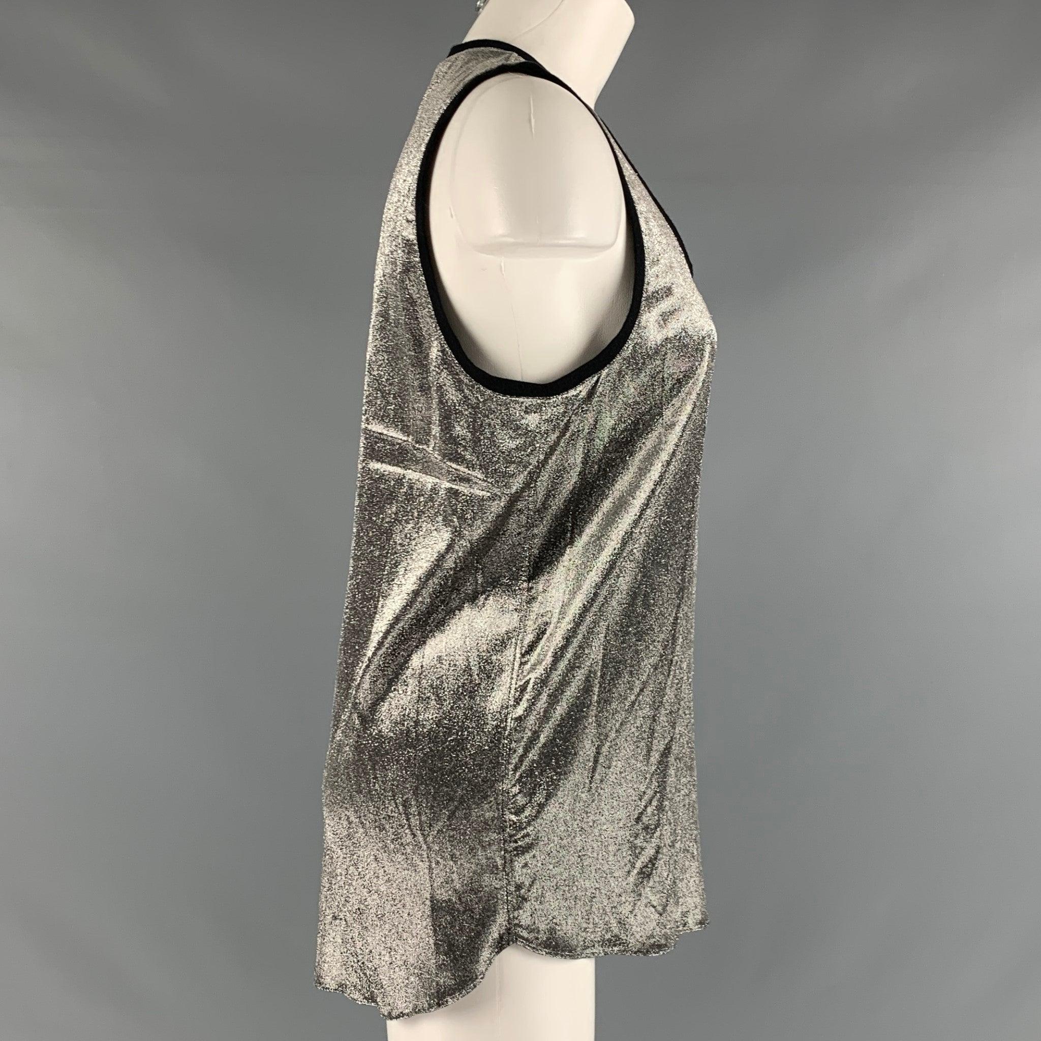 FAITH CONNEXION tank comes in a silver metallic silk blend knit material. Very Good Pre-Owned Condition. 

Marked:   S 

Measurements: 
  Bust: 40 inches Length: 27.5 inches 
  
  
 
Reference: 127373
Category: Tank Top
More Details
    
Brand: 