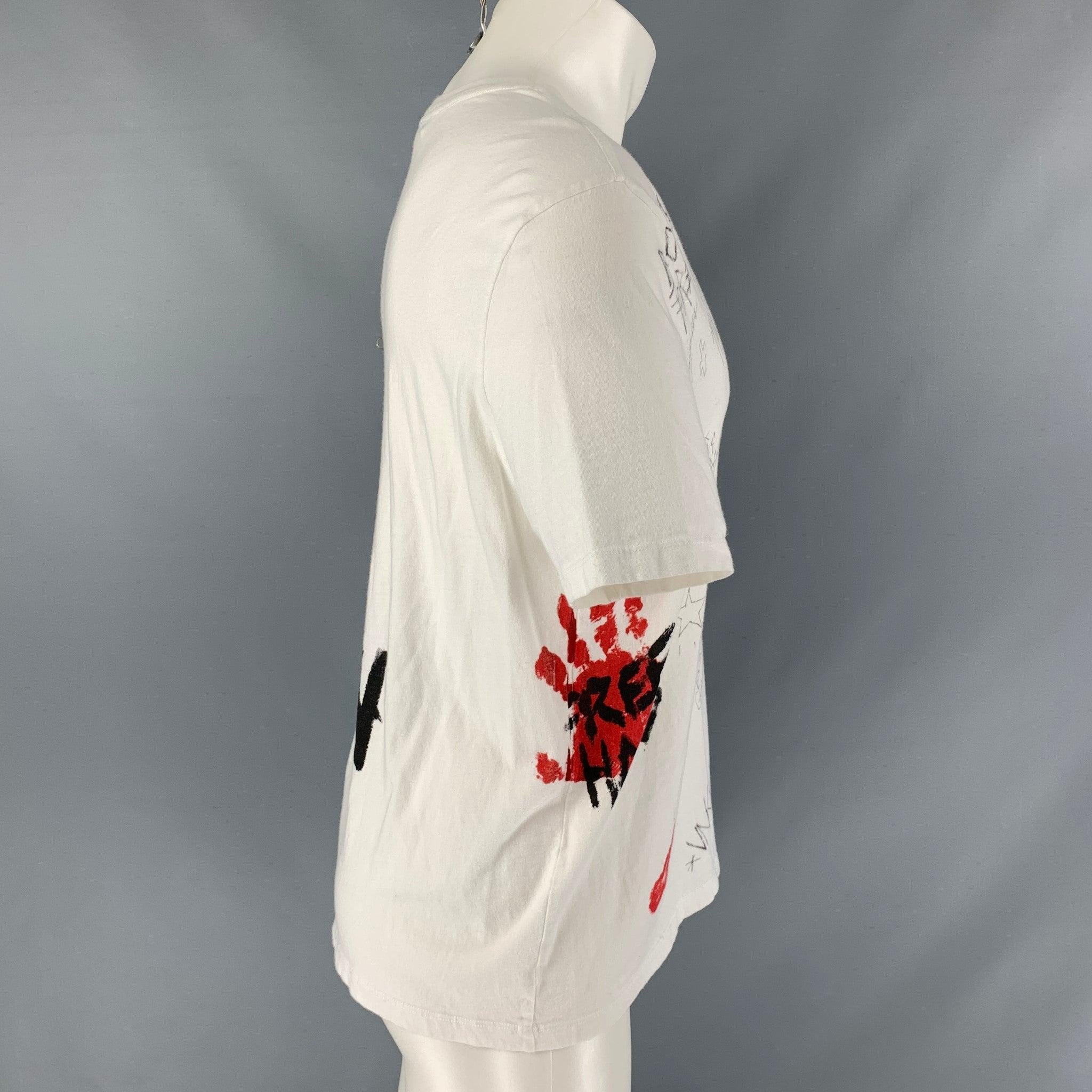 FAITH CONNEXION oversized t-shirt comes in a white cotton featuring a black and red graphic graffiti style print design featuring a crew-neck. Very Good Pre-Owned Condition. Minor signs of wear. 

Marked:   S 

Measurements: 
 
Shoulder: 21 inches