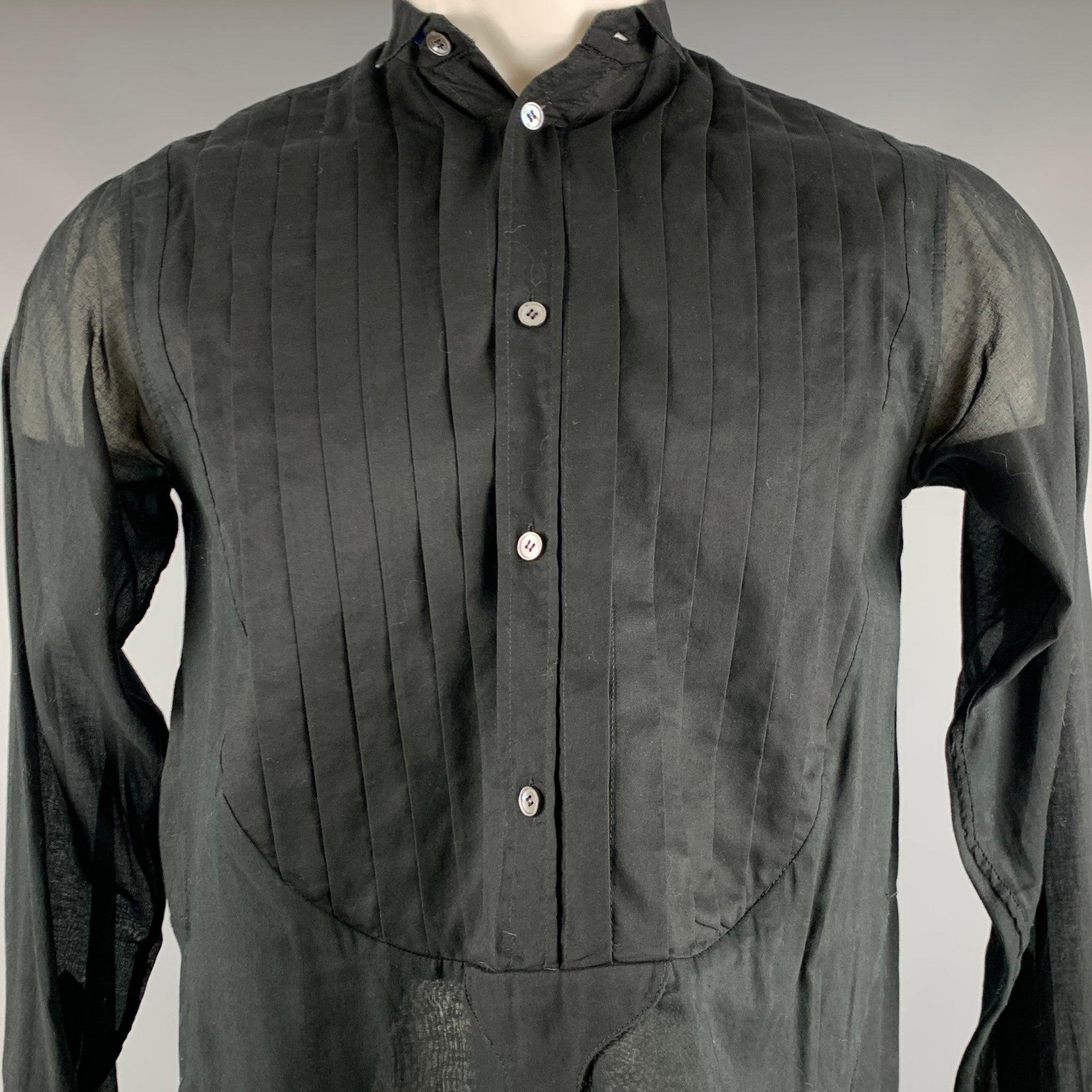 FAITH CONNEXION long sleeve shirt
in a black cotton fabric featuring long tails, pleated front, wingtip tuxedo collar, and half placket closure. Made in Romania.Excellent Pre-Owned Condition. 

Marked:   XS 

Measurements: 
 
Shoulder: 16 inches
