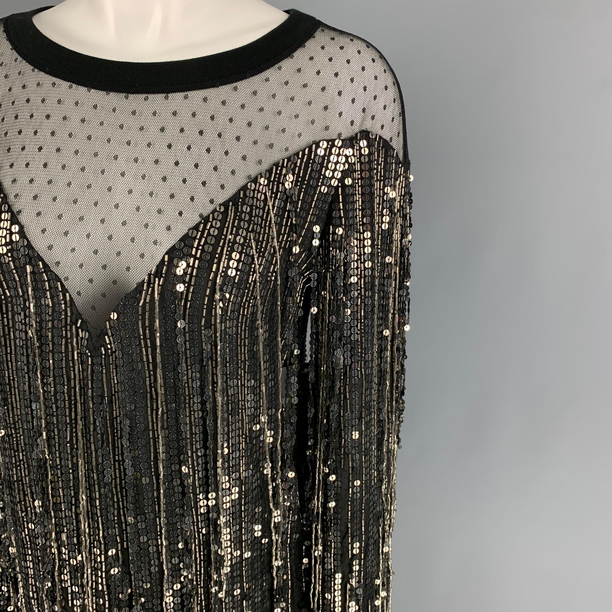 FAITH CONNEXION dress top comes in a black & gold viscose featuring a mesh panel, oversized fit, fringe sequin details, beaded, and a crew-neck. 

New With Tags.
Marked: XS

Measurements:

Shoulder: 17 in.
Bust: 34 in.
Sleeve: 24 in.
Length: 27 in. 