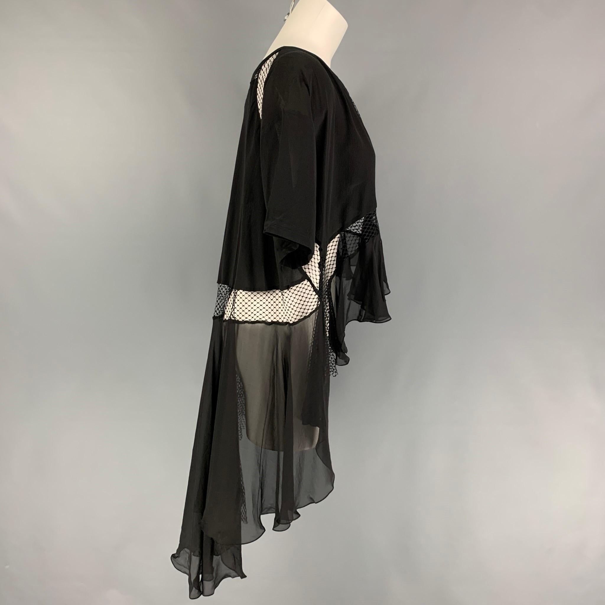 FAITH CONNEXION dress top comes in a black silk featuring a asymmetrical style, loose fit, mesh panel, ruffled, long, short sleeves, and a loose neckline. Made in Italy.

New With Tags. 
Marked: XS
Original Retail Price: