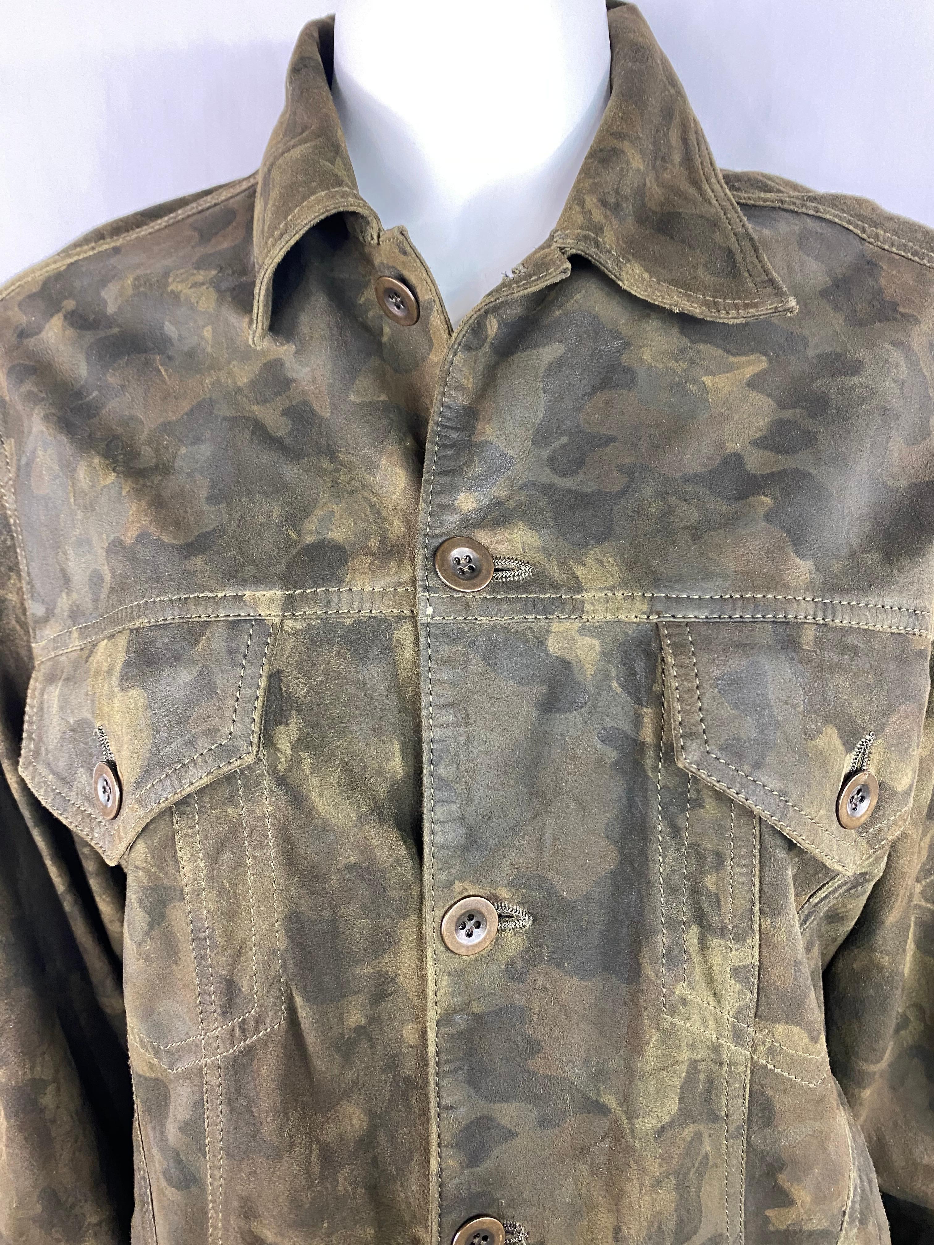 Product details:

The jacket is made out of 100% goat leather and it feels like suede, featuring army camouflage print, collar, golt tone hardware, front button closure. 